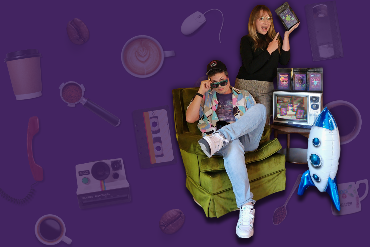 Tiffany and Chris from Streets Ahead Coffee Roasters in front of 90's nostalgic items and coffee items