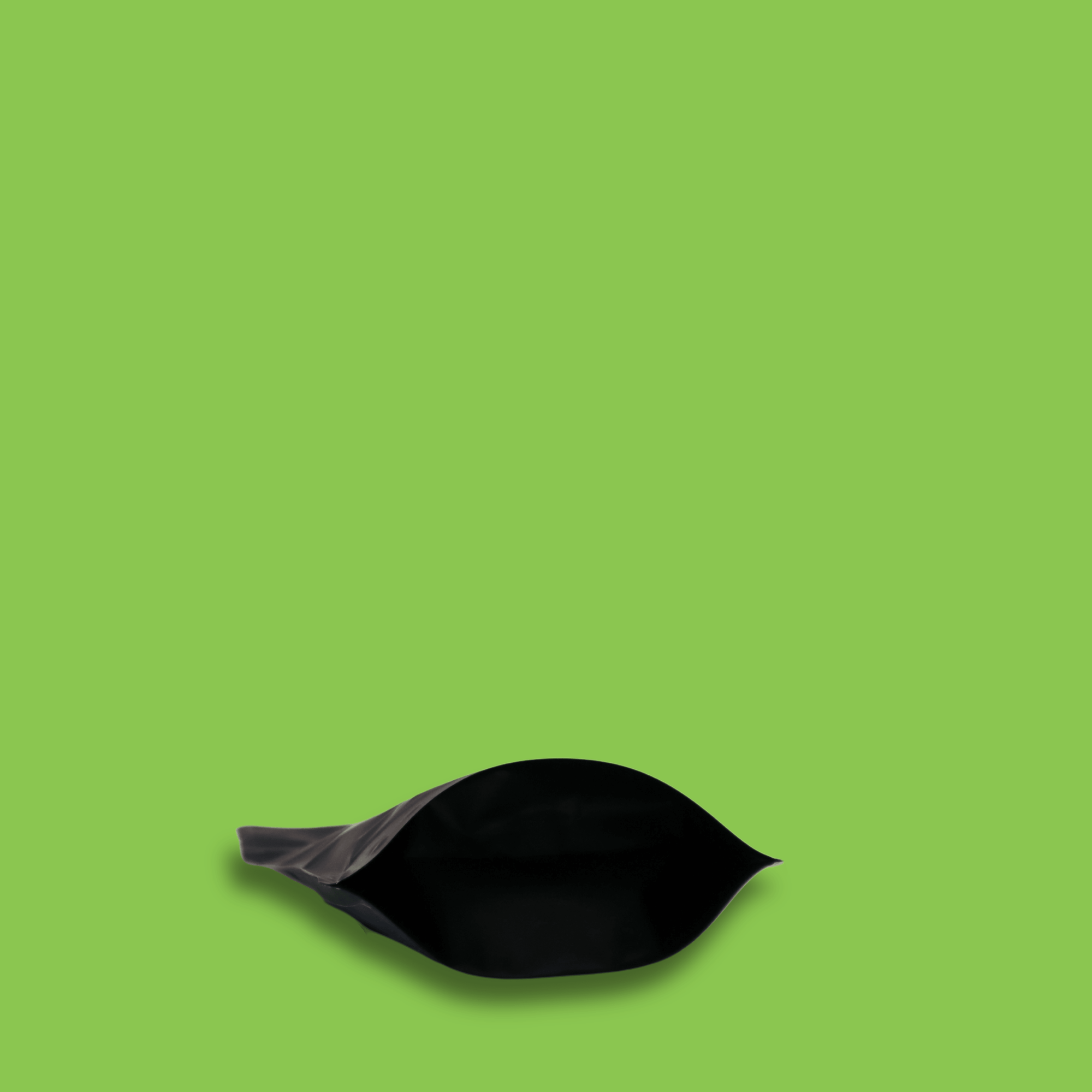 The bottom of a 125g bag of dark roast, whole bean, Shadow Panther specialty coffee with a green background. 