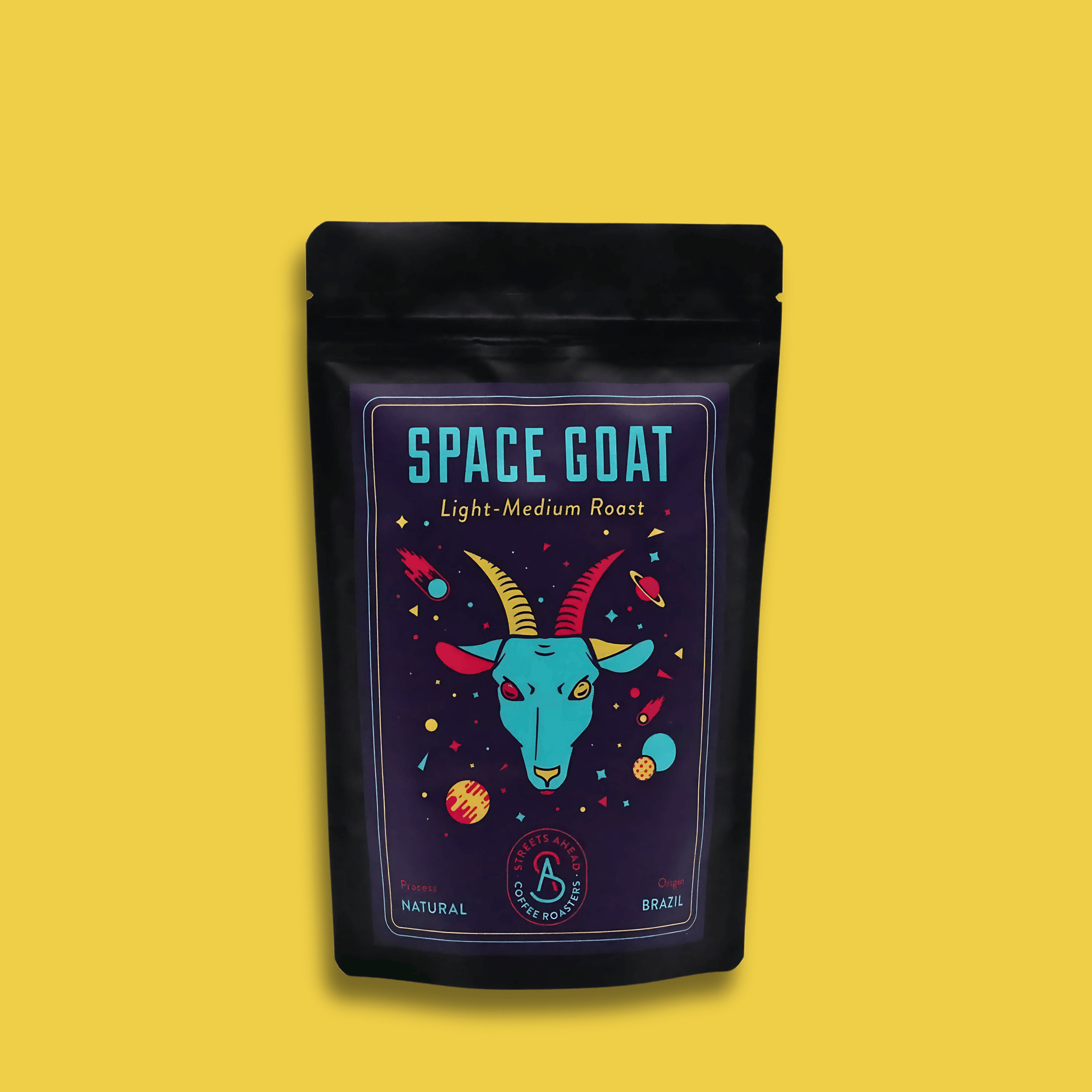 A 125g bag of light roast, whole bean, Space Goat specialty coffee with a yellow background.