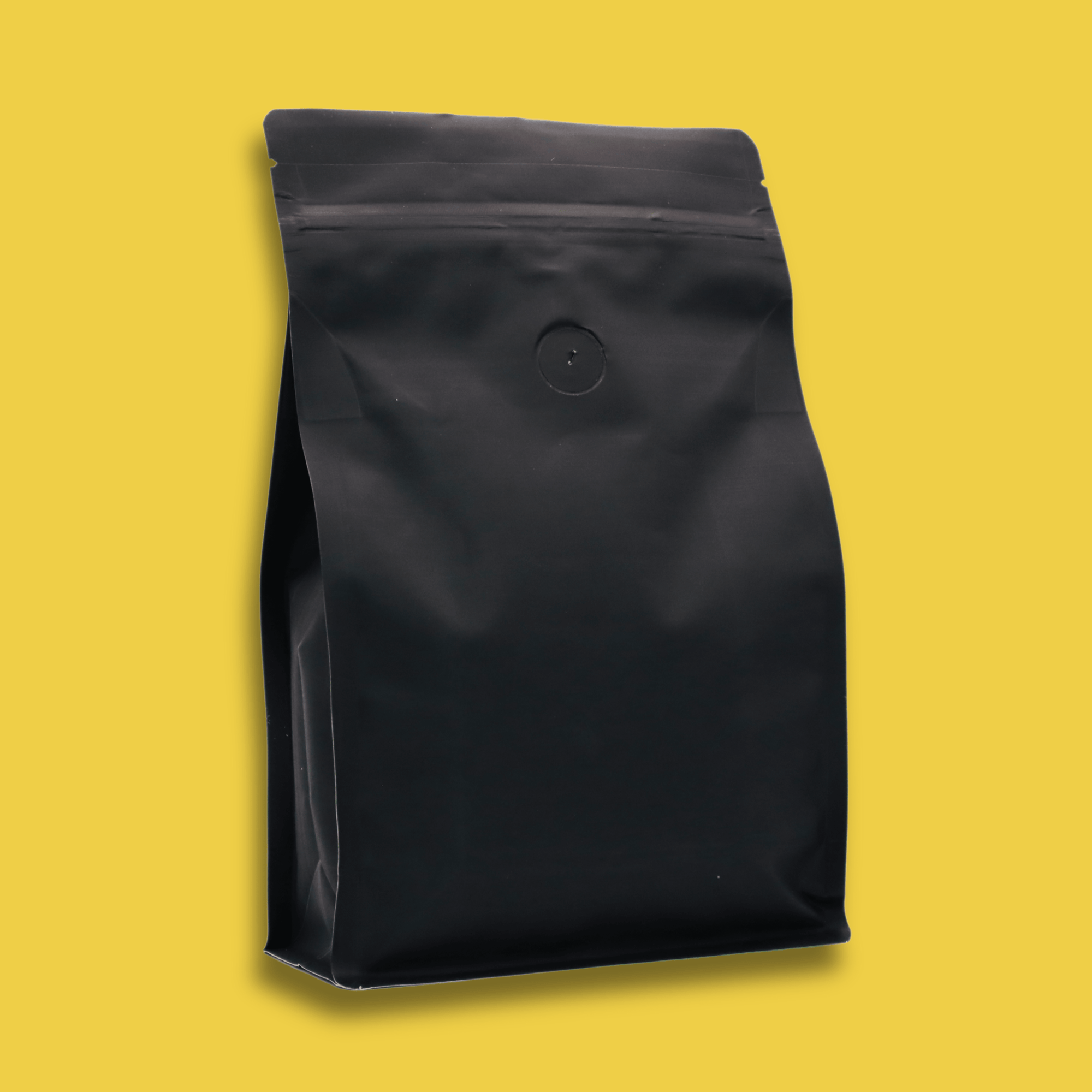 The back of a 340g bag of light roast, ground, Space Goat specialty coffee with a yellow background.