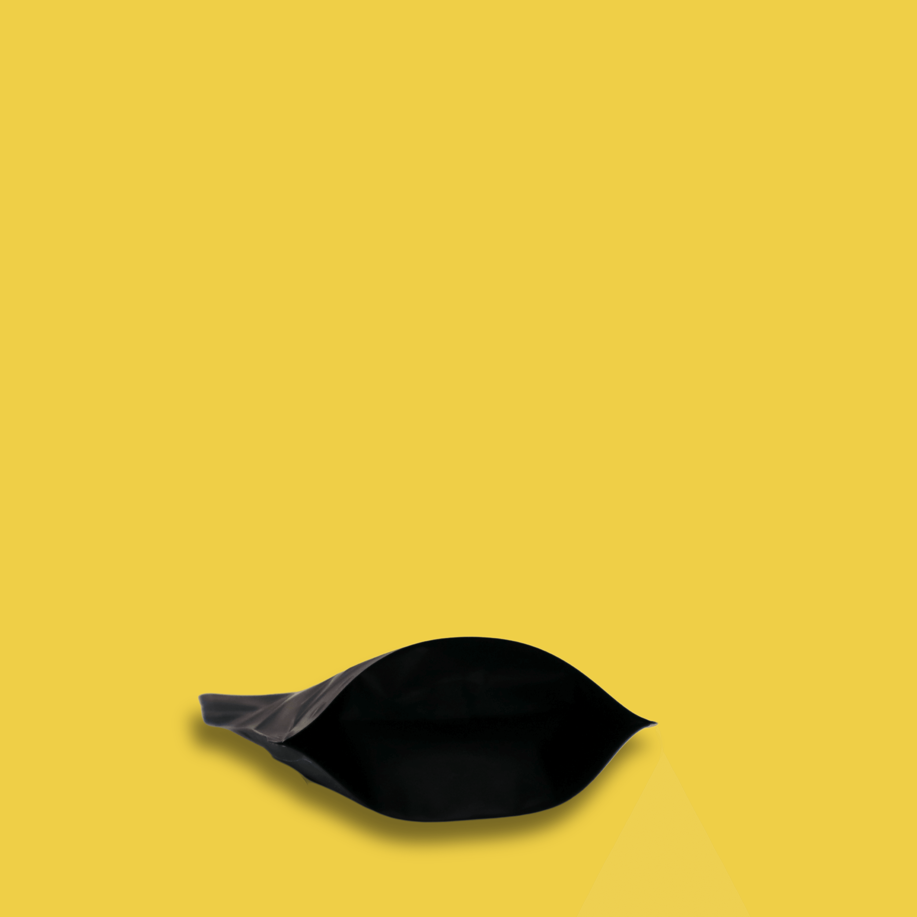 The bottom of a 125g bag of light roast, whole bean, Space Goat specialty coffee with a yellow background. 