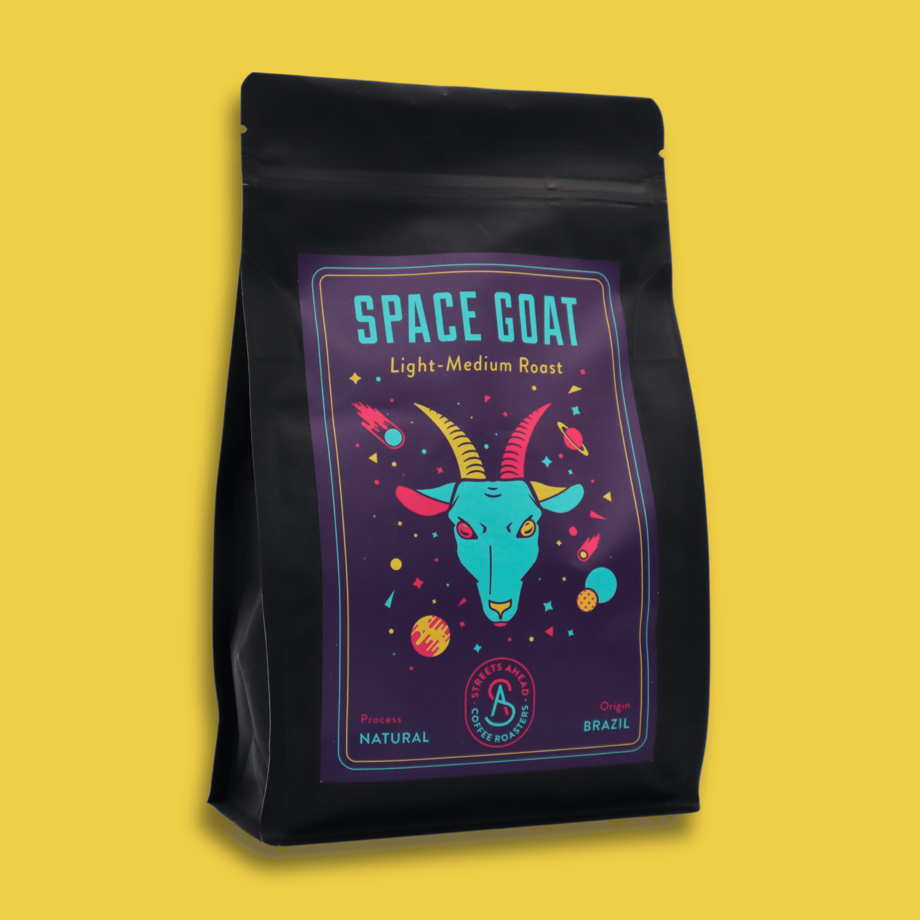 A 340g bag of light roast, whole bean, Space Goat specialty coffee with a yellow background.