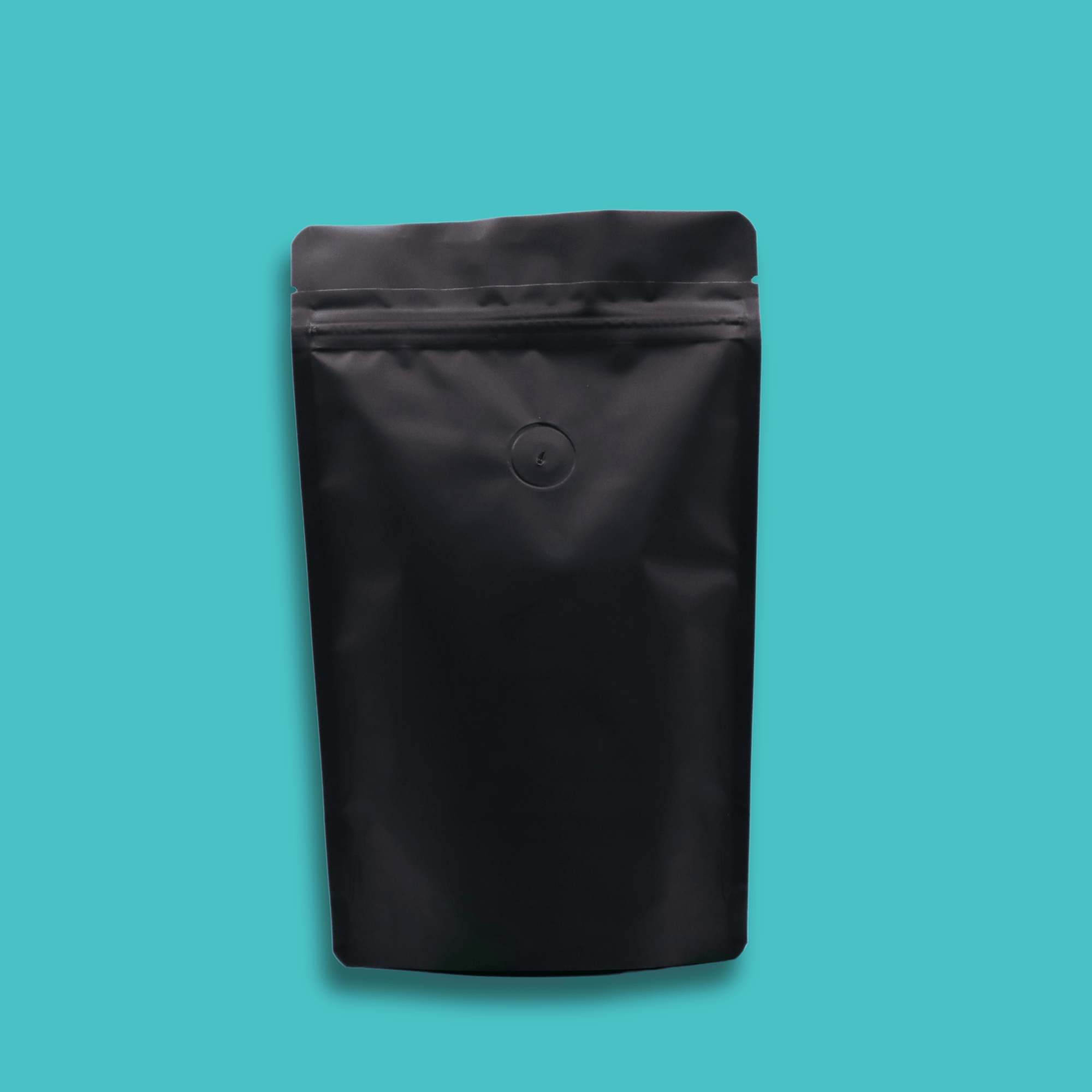 The back of a 125g bag of medium roast, ground, Danger Wolf specialty coffee in front of a blue background.