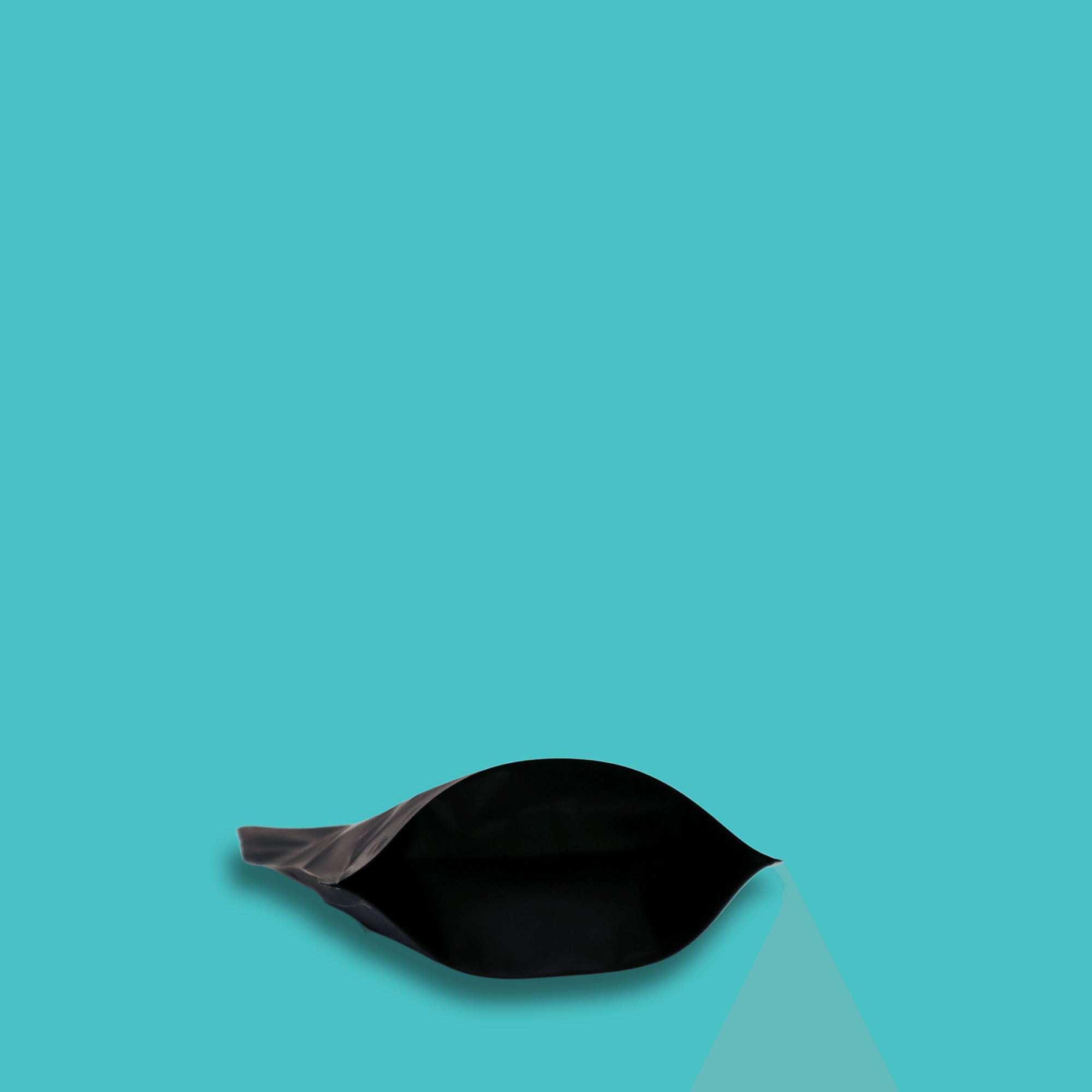 The bottom of a 125g bag of medium roast, whole bean, Danger Wolf specialty coffee in front of a blue background. 