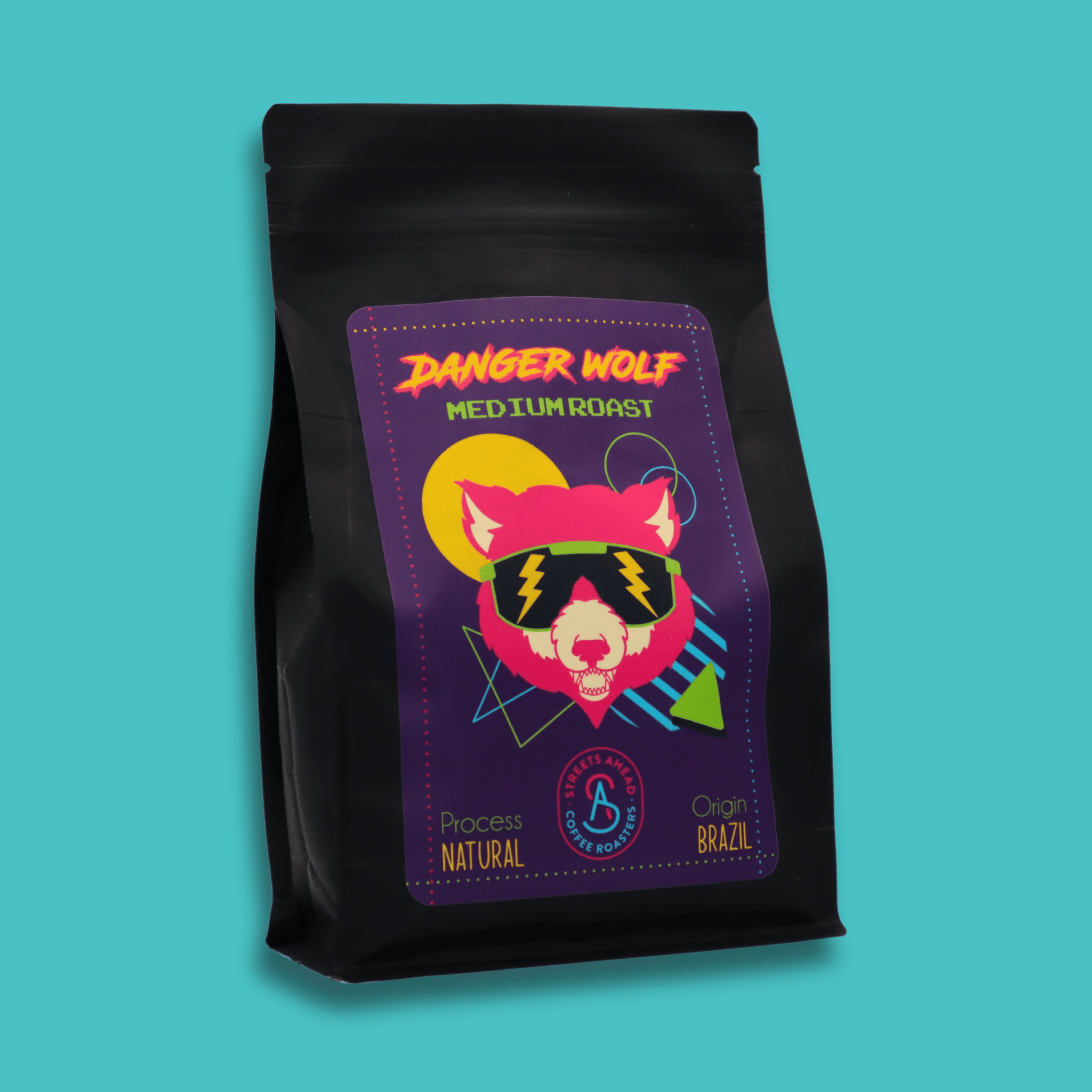 A 340g bag of medium roast, whole bean, Danger Wolf specialty coffee with a blue background.