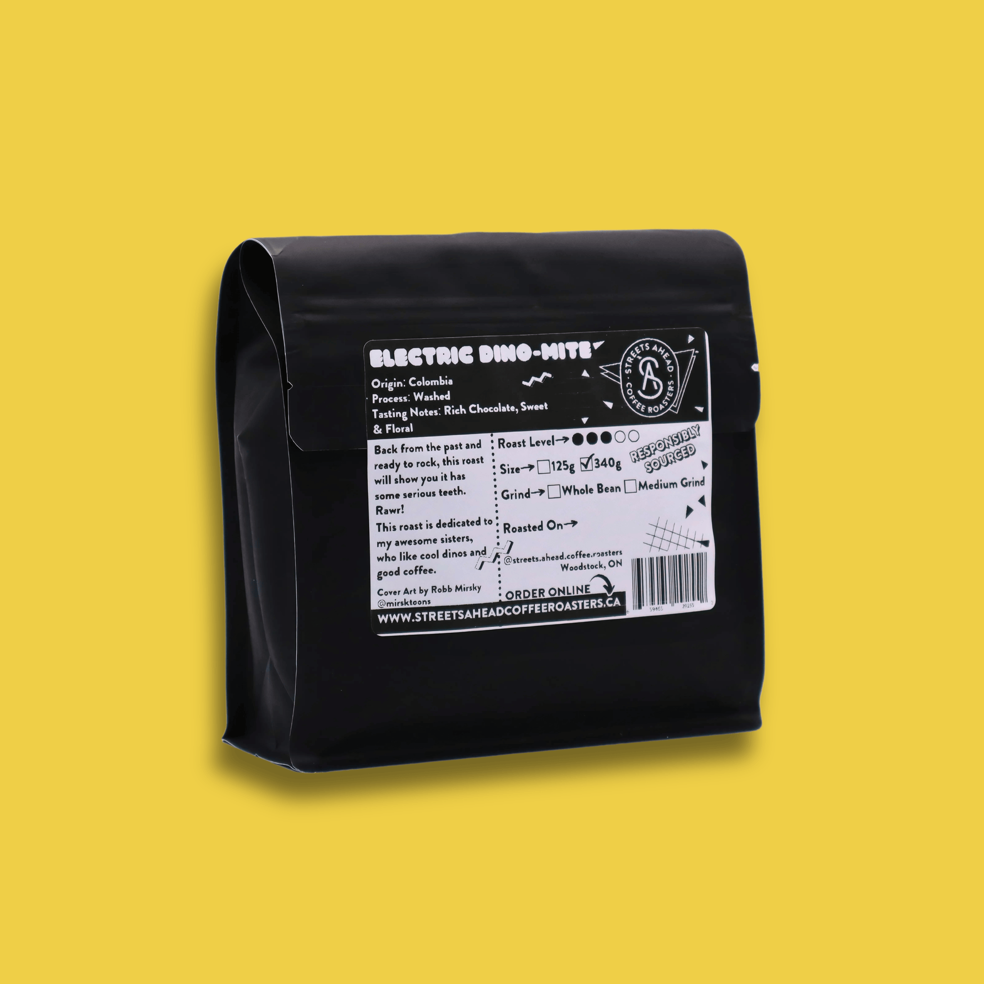 The back of a 340g bag of medium roast, whole bean, Electric Dino-Mite specialty coffee in front of a yellow background.